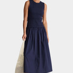 Midnight navy smocked bodice maxi dress sleeveless crew neck organic cotton A-line silhouette full length front view