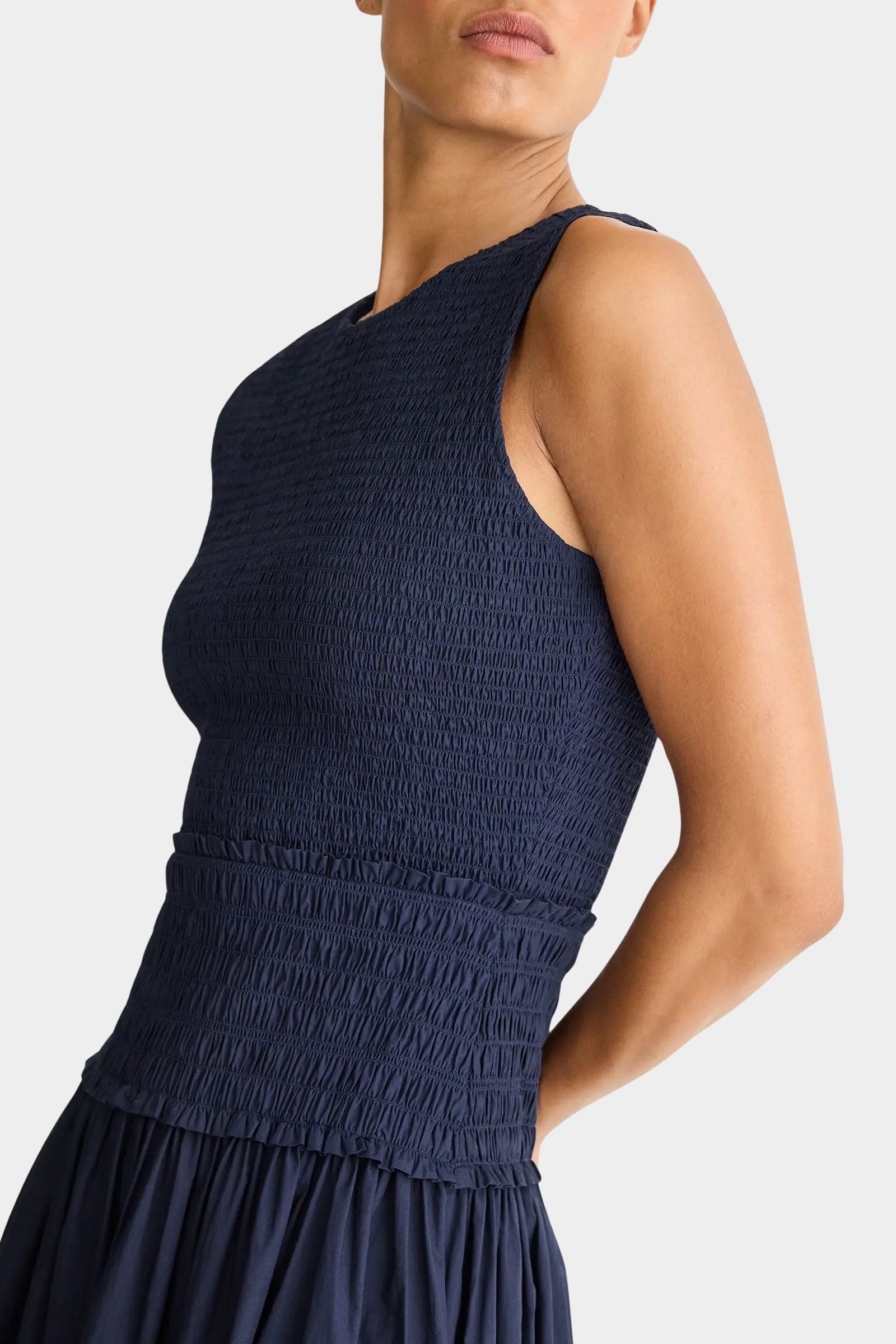 Midnight navy maxi dress back view sleeveless smocked bodice organic cotton A-line silhouette full length