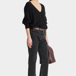 Apiece Apart Softest Silk Cashmere V Neck Black sweater styled with cropped jeans