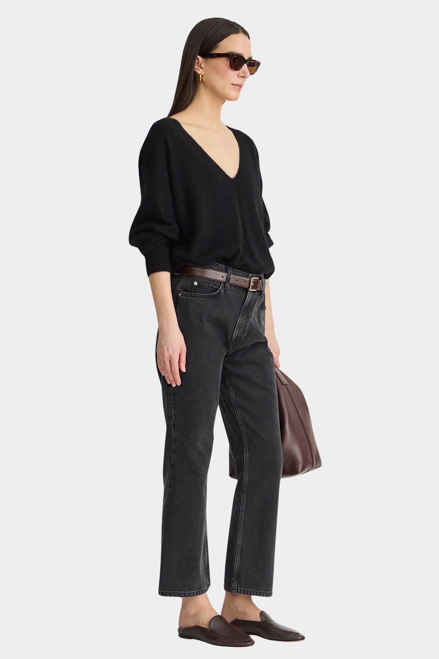 Apiece Apart Softest Silk Cashmere V Neck Black sweater styled with cropped jeans