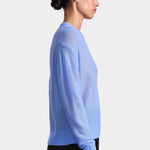Apiece Apart Softest Tissue Weight Sweater in Cornflower blue cashmere silk knit styled with tailored trousers at YUCCA Denver