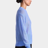 Apiece Apart Softest Tissue Weight Sweater in Cornflower blue cashmere silk knit styled with tailored trousers at YUCCA Denver