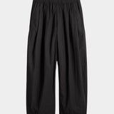 Apiece Apart Spa Pleat Pant black organic cotton pleated barrel leg trousers front view