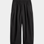 Apiece Apart Spa Pleat Pant Black with elastic waist and softly tapered wide leg silhouette