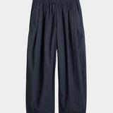 Apiece Apart Spa Pleat Pant Navy flat lay product image in lightweight organic cotton with pleated volume and tapered leg