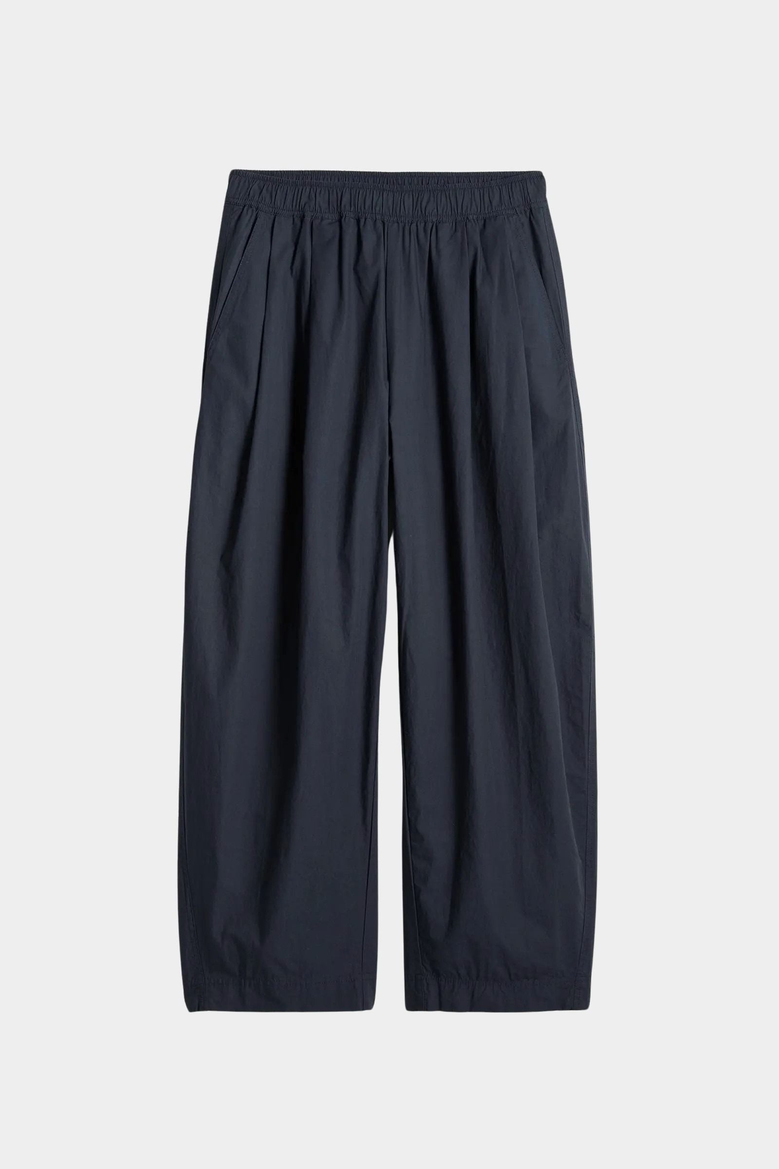 Apiece Apart Spa Pleat Pant Navy flat lay product image in lightweight organic cotton with pleated volume and tapered leg
