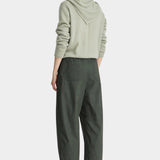 Apiece Apart Spa Pleat Pant Rosin back view featuring patch pockets, an elastic waistband, and a relaxed cropped fit.