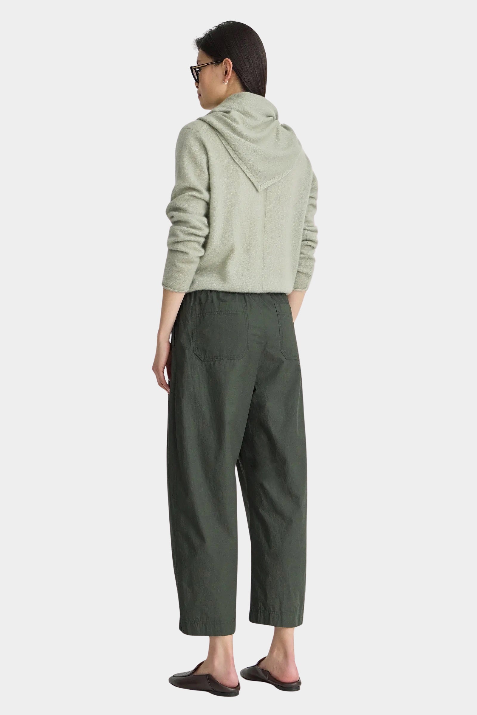Apiece Apart Spa Pleat Pant Rosin back view featuring patch pockets, an elastic waistband, and a relaxed cropped fit.