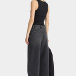 Apiece Apart Uri Low Cut Tank Black fitted tank back view with wide leg jeans