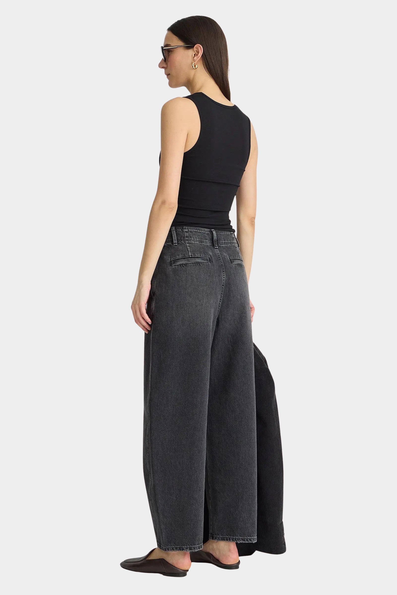 Apiece Apart Uri Low Cut Tank Black fitted tank back view with wide leg jeans