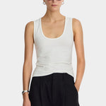 Front view of Apiece Apart Uri Low-Cut Tank Cream with scoop neckline and fitted silhouette
