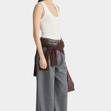 Apiece Apart Uri Low Cut Tank White side view styled with wide leg trousers