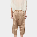 Atelier Delphine Kiko pant in latte back view showing relaxed drop crotch silhouette and cropped length
