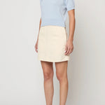 Atelier Delphine Mari Mari top pastel blue side view with short sleeves and structured silhouette