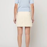Atelier Delphine Mari knit top pastel blue back view showing compact fit and rib hem