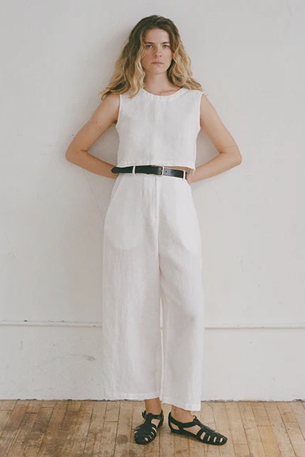 Shaina Mote Paradis trouser in natural organic cotton front view with high rise, straight leg and black belt styling