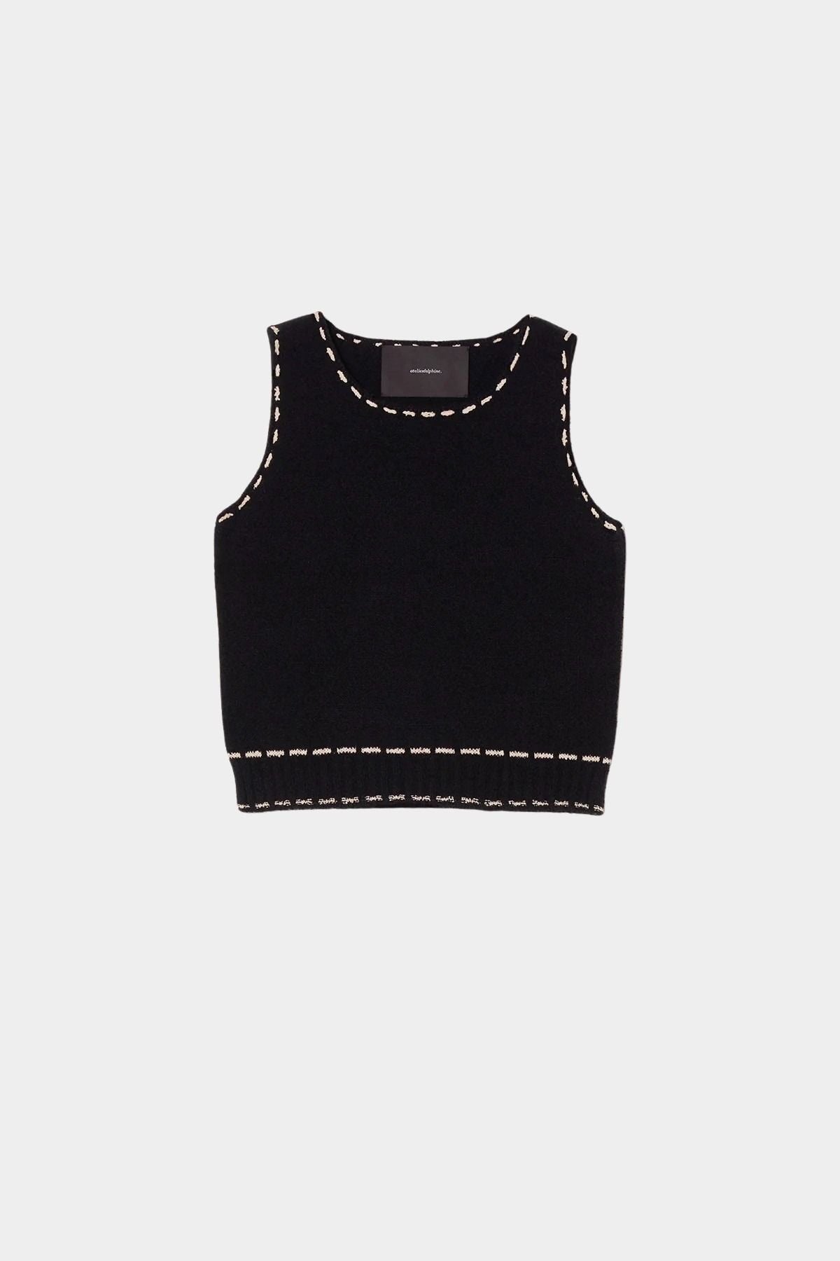 Atelier Delphine knit tank top in black and tan flat lay showing cropped silhouette and contrast stitching detail