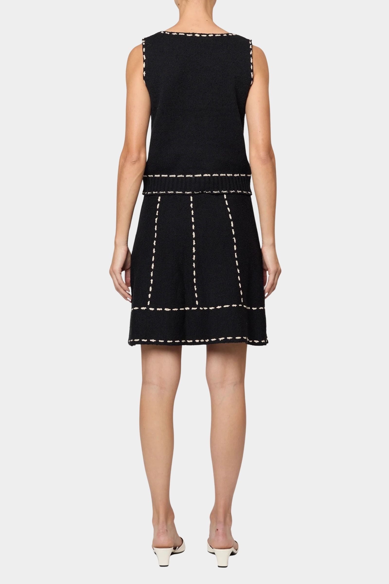 Atelier Delphine knit tank top in black and tan back detail showing sleeveless cut and contrast stitch trim