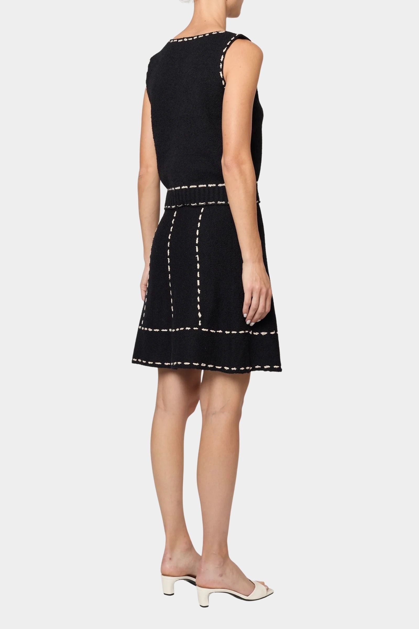 Atelier Delphine knit tank top in black and tan back view with contrast stitch trim and sleeveless silhouette