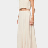 Atelier Delphine super crop sweater tank in cream front view with matching skirt showing cropped silhouette