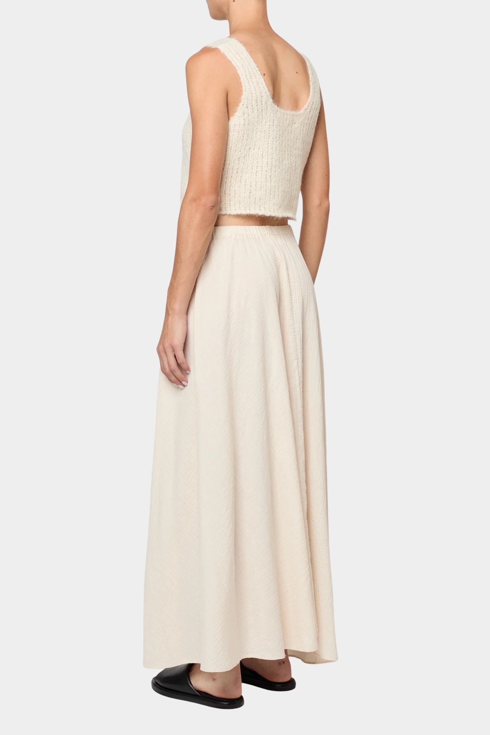 Atelier Delphine super crop sweater tank in cream full back outfit view with matching skirt and cropped fit