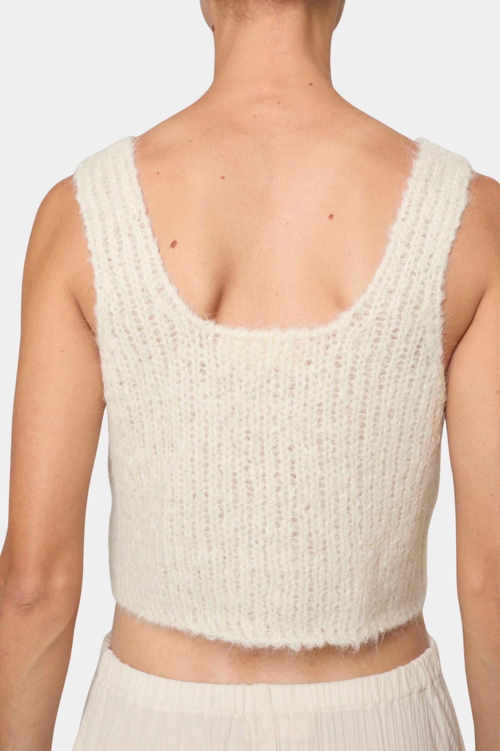 Atelier Delphine super crop sweater tank in cream back view showing deep scoop back and fuzzy knit texture