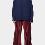 Woman wearing Atelier Delphine Vasilisa Turtleneck Sweater Navy front view