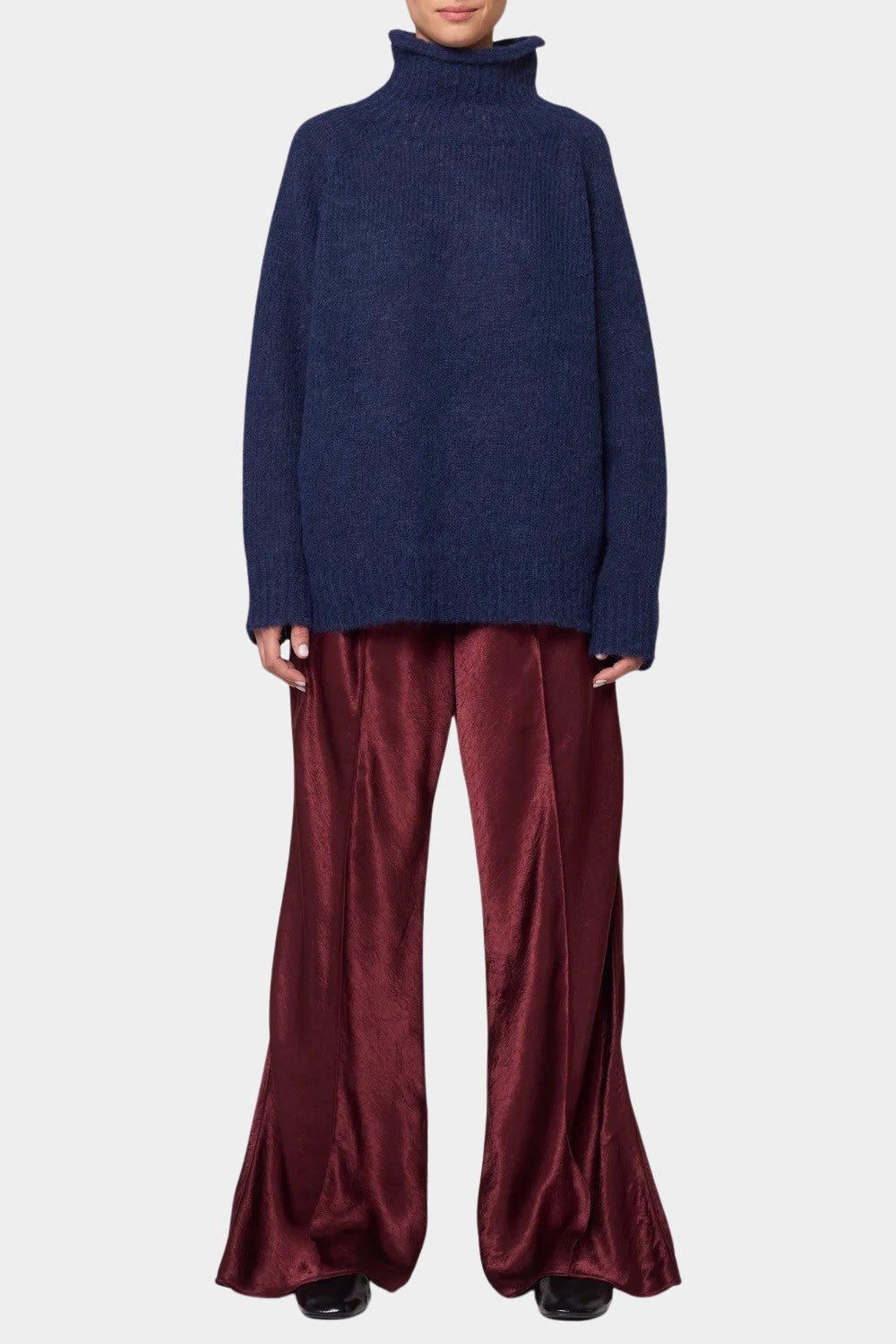 Woman wearing Atelier Delphine Vasilisa Turtleneck Sweater Navy front view