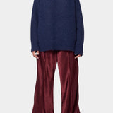 Woman wearing Atelier Delphine Vasilisa Turtleneck Sweater Navy front view