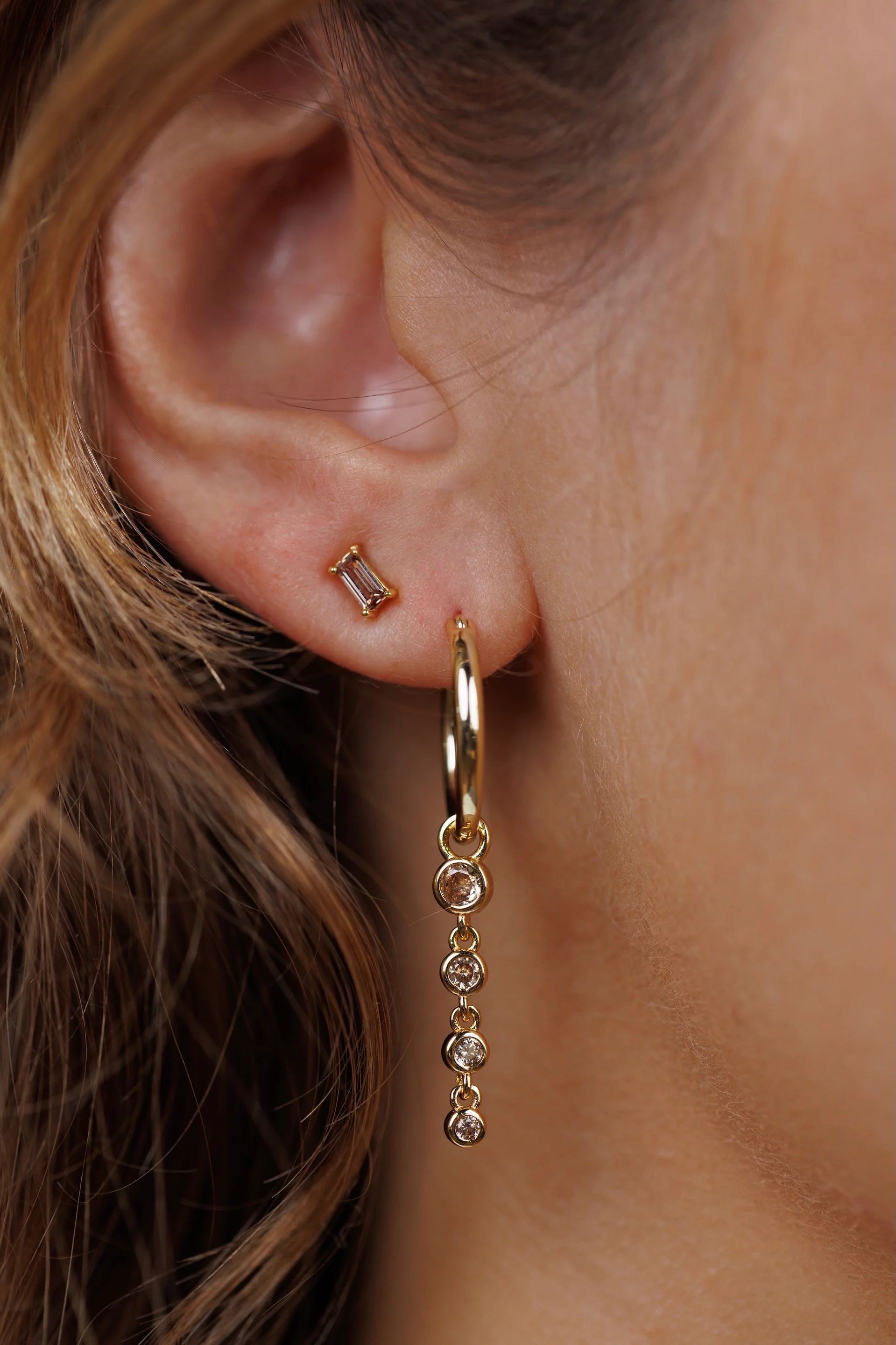 Earrings - YUCCA, coffee colored baguette CZ stud earrings with gold plating and sterling silver posts.
