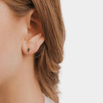 Earrings - YUCCA, emerald colored baguette stud earrings with gold plating and sterling silver posts.