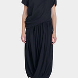Black Crane asymmetric cotton gauze top in sumi black on model with relaxed drape full outfit view