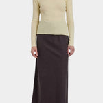 Black Crane Bias Skirt Dark Plum front view styled with fitted long sleeve top