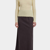 Black Crane Bias Skirt Dark Plum front view styled with fitted long sleeve top