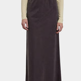 Black Crane Bias Skirt Dark Plum front view showing streamlined maxi silhouette at YUCCA Denver