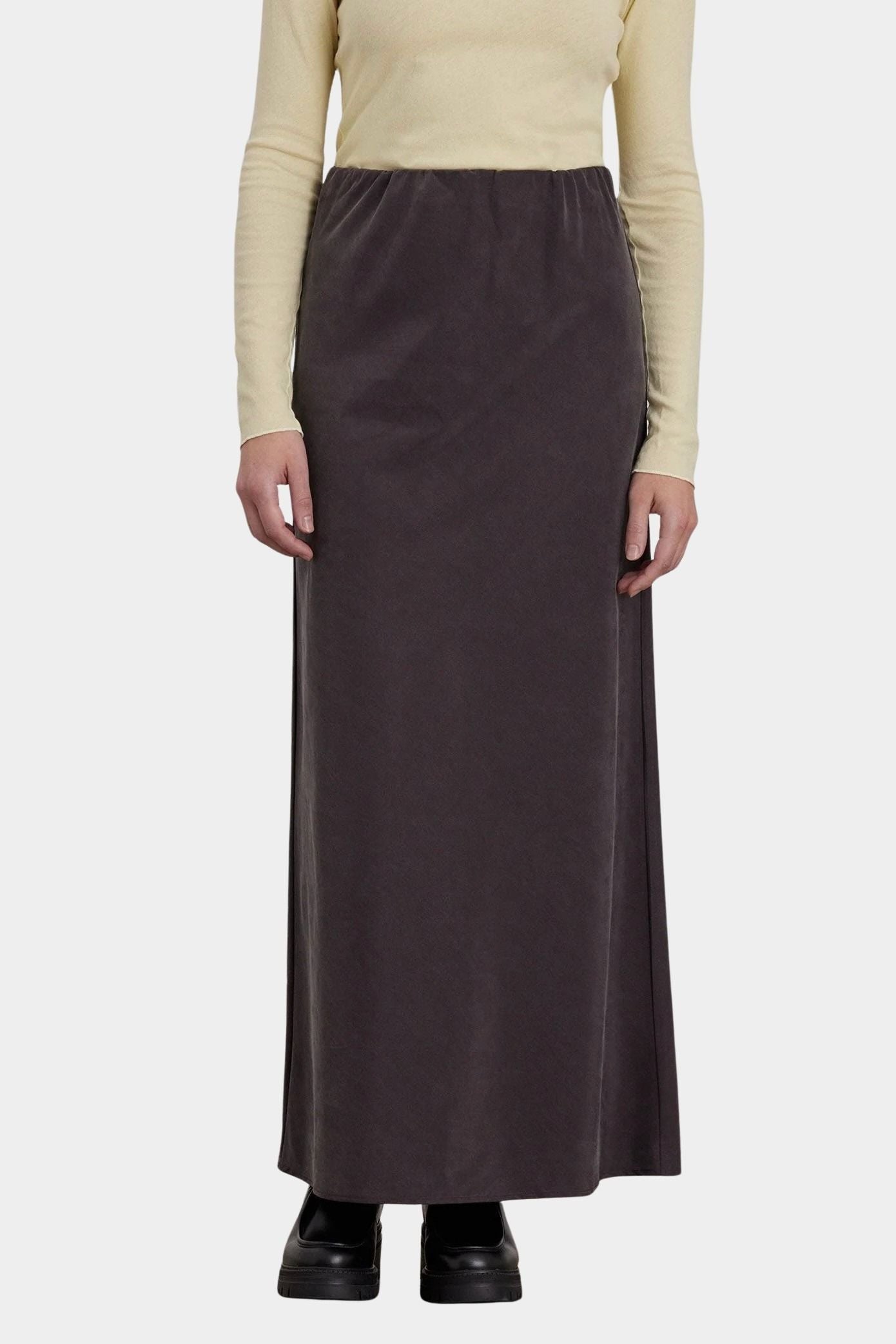Black Crane Bias Skirt Dark Plum front view showing streamlined maxi silhouette at YUCCA Denver