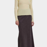 Black Crane Bias Skirt Dark Plum three quarter front view with fluid maxi length