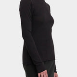 Black Crane Boat Neck Long Sleeve Black side view showing soft jersey drape and raw edge finish