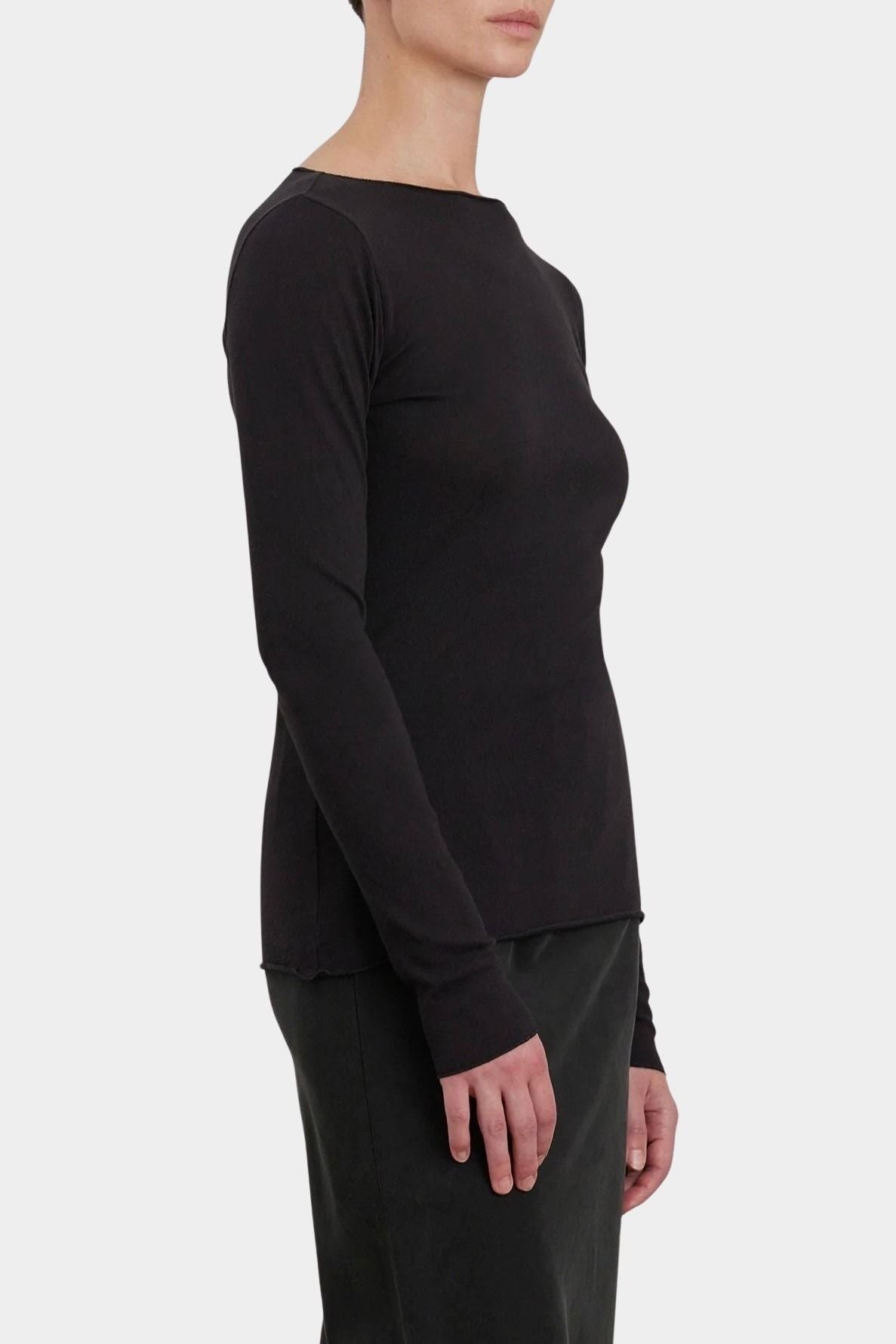 Black Crane Boat Neck Long Sleeve Black side view showing soft jersey drape and raw edge finish