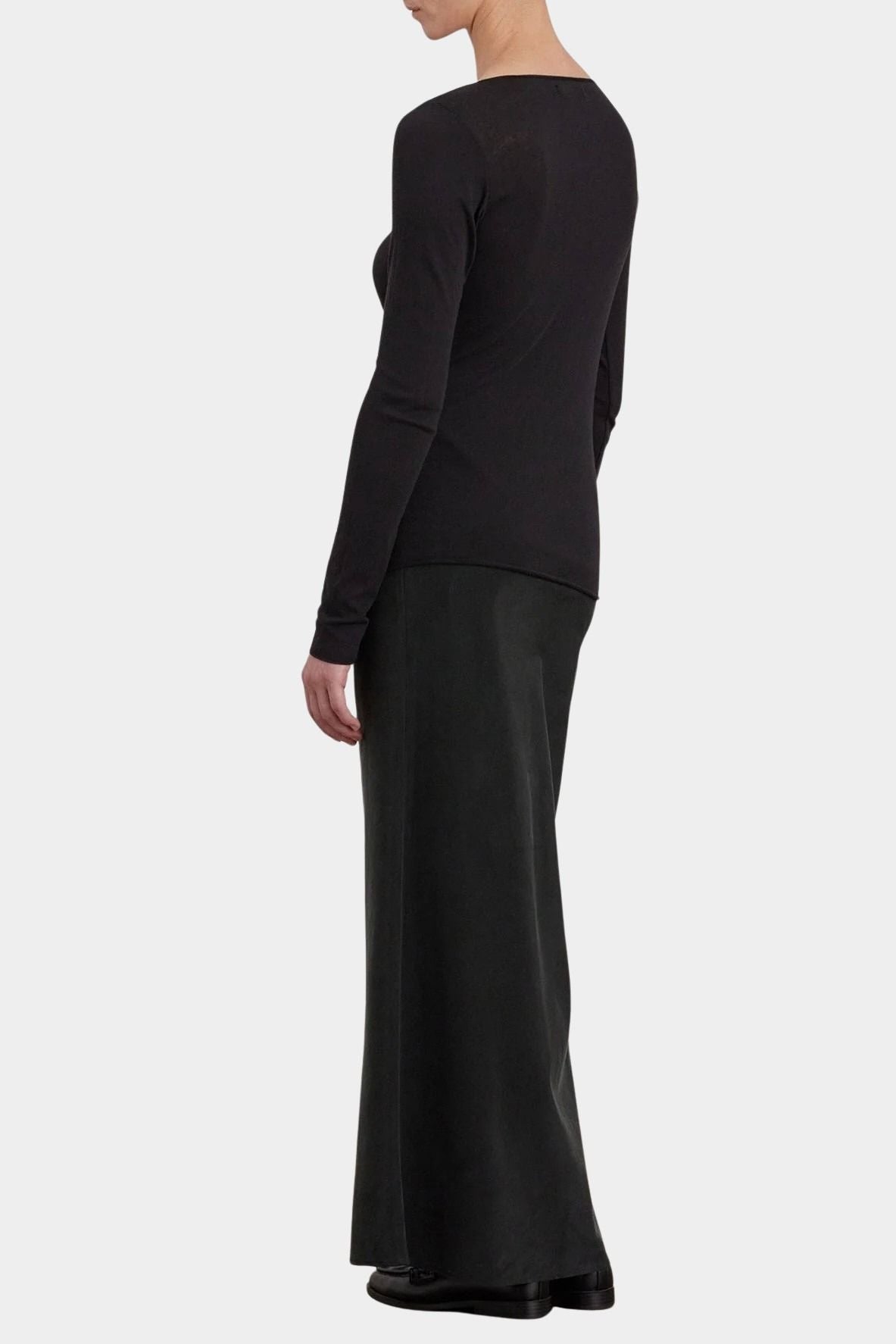 Black Crane Boat Neck Long Sleeve Black back three quarter view styled with a long black skirt