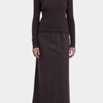 Black Crane Boat Neck Long Sleeve Dark Plum full front view styled with matching dark plum skirt