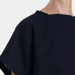 Black Crane boxed top midnight raw edge neckline detail textured cotton close up