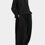 Black Crane Cropped Long Sleeve Black styled with matching pants, full length side view