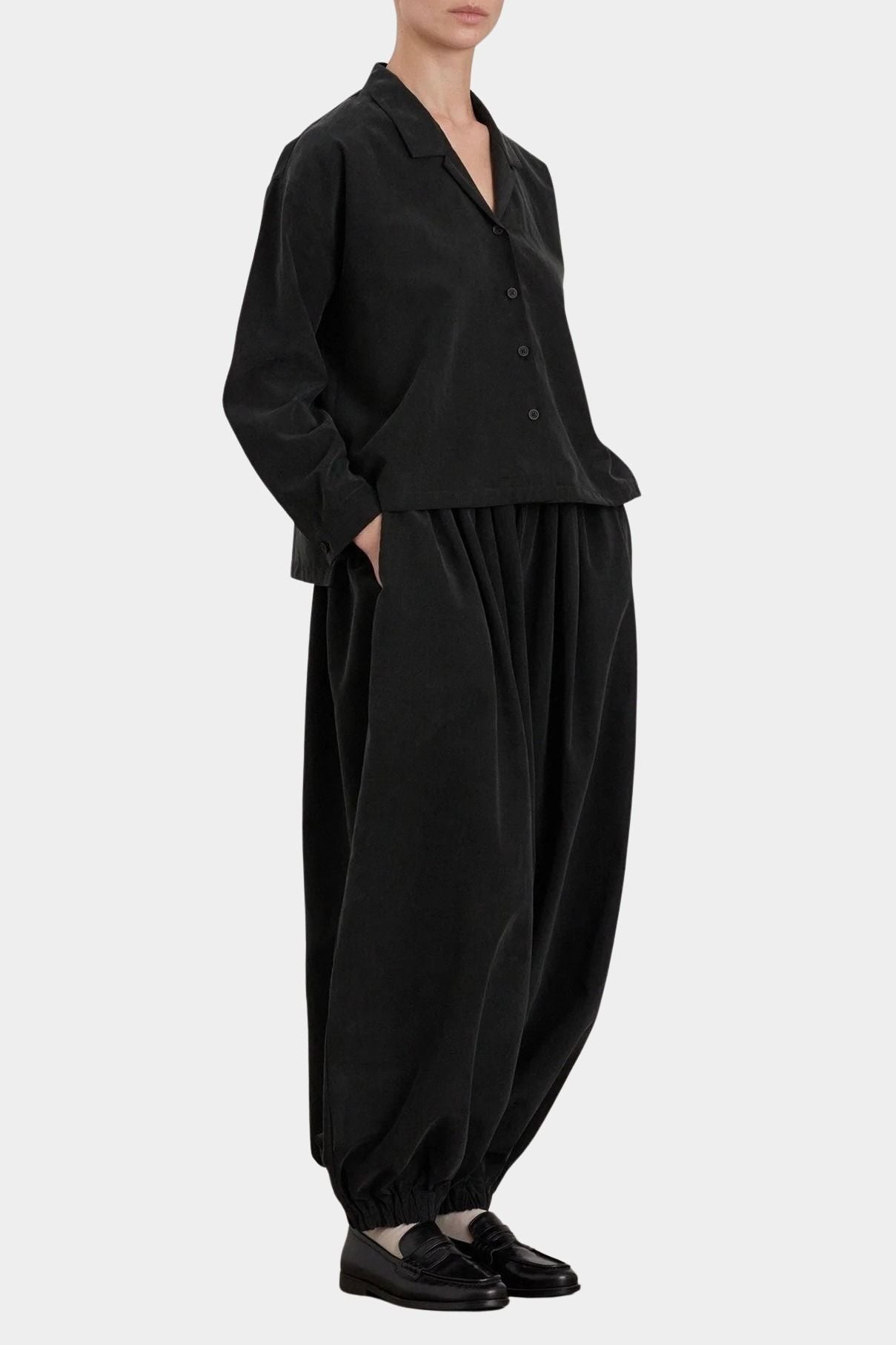 Black Crane Cropped Long Sleeve Black styled with matching pants, full length side view