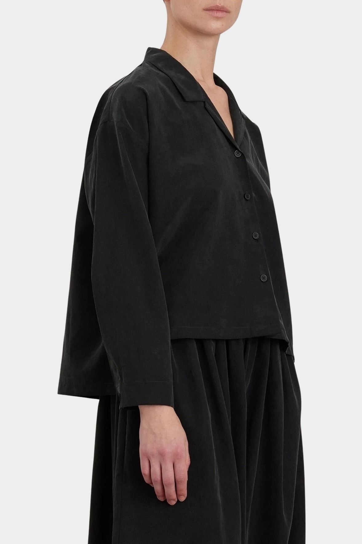 Black Crane Cropped Long Sleeve Black side view showing relaxed cropped silhouette