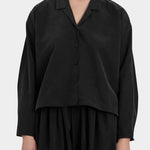 Black Crane Cropped Long Sleeve Black front view with open collar and button closure