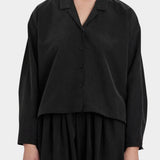 Black Crane Cropped Long Sleeve Black front view with open collar and button closure