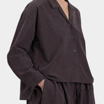 Black Crane Dark Plum relaxed button shirt three quarter view with matching pants