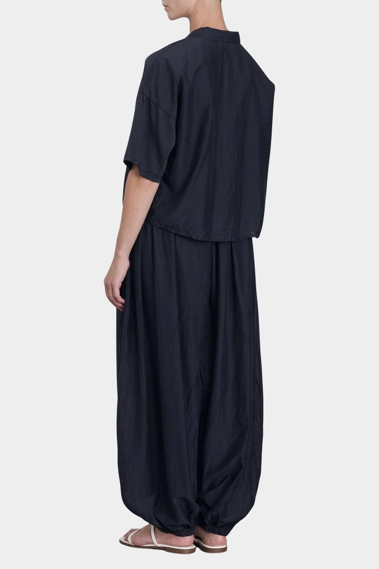 Black Crane faded black cropped shirt back view with relaxed fit