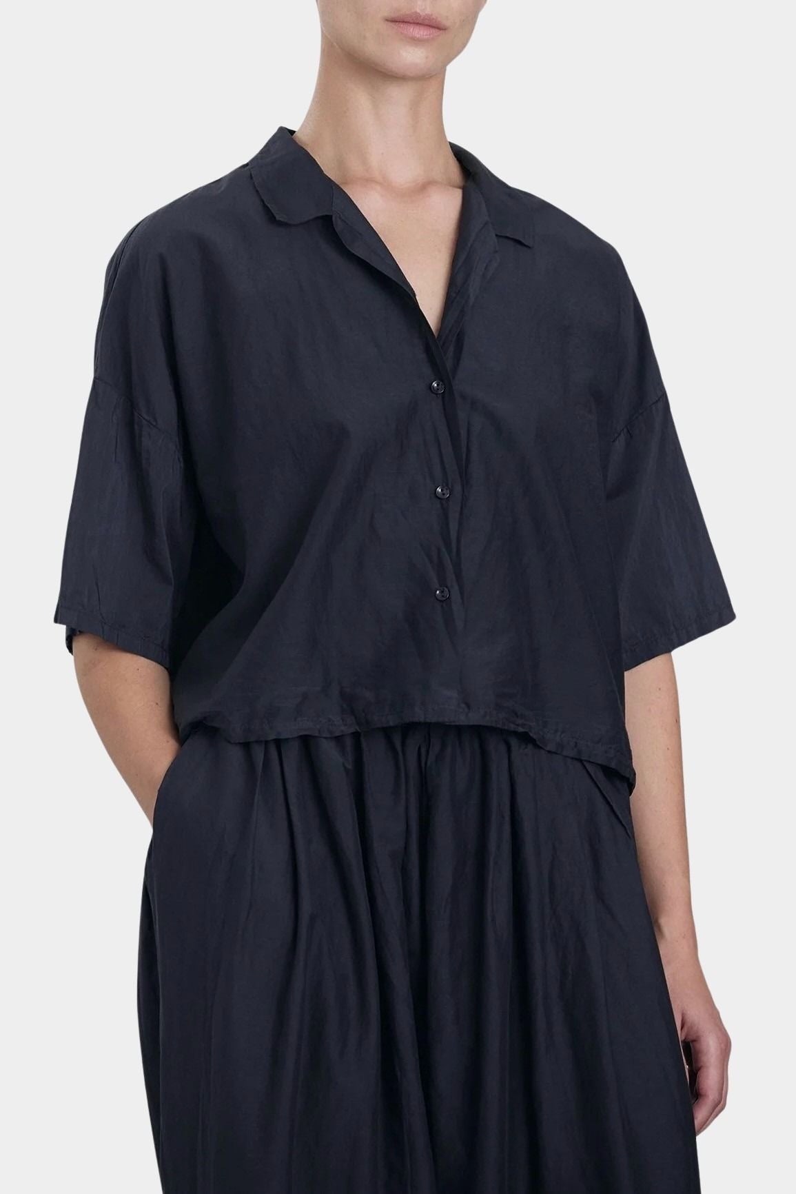 Black Crane cropped shirt faded black close-up of collar and button front detail